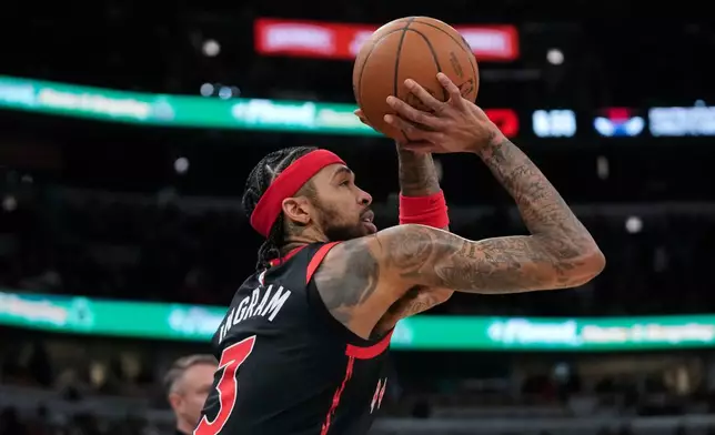 Toronto Raptors forward Brandon Ingram (3) sinks a three-point shot during the second half of an NBA basketball game against the Chicago Bulls, Thursday, Feb. 19, 2026, in Chicago. (AP Photo/Erin Hooley)