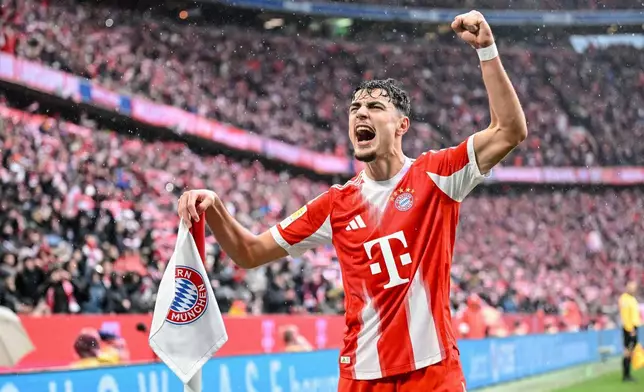 Bayern Munich's Aleksandar Pavlovic celebrates scoring during the Bundesliga soccer match between Bayern Munich and Eintracht Frankfurt in Munich, Germany, Saturday Feb. 21, 2026. (Harry Langer/dpa via AP)