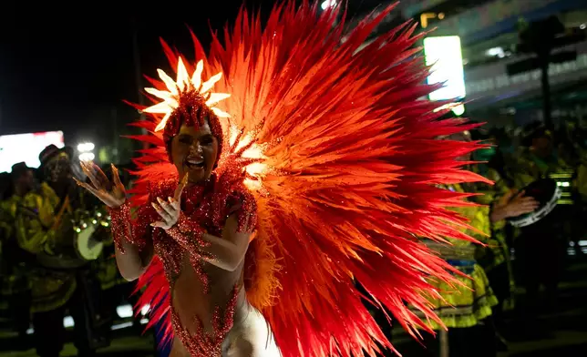 Drum queen Mileide Mihaile from Unidos da Tijuca samba school performs during Carnival celebrations at the Sambadrome in Rio de Janeiro, early Tuesday, Feb. 17, 2026. (AP Photo/Bruna Prado)