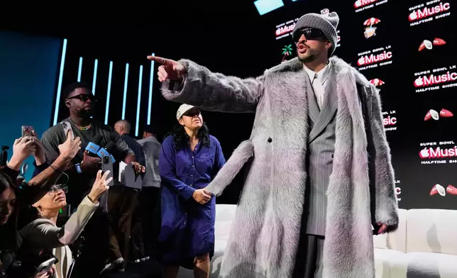 Apple Music Super Bowl LX Halftime Show performer Bad Bunny departs after a news conference, Thursday, Feb. 5, 2026, in San Francisco ahead of the NFL Super Bowl 60 football game between the Seattle Seahawks and the New England Patriots. (AP Photo/Godofredo A. Vásquez)