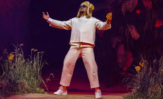 FILE - Bad Bunny performs during his first show of his 30-date concert residency at the Coliseo de Puerto Rico José Miguel Agrelot, in San Juan, Puerto Rico on July 11, 2025. (AP Photo/Alejandro Granadillo, File)