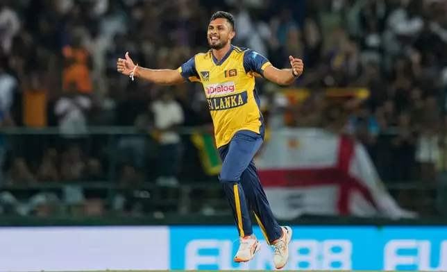 Sri Lanka's Dasun Shanaka celebrates the dismissal of England's Jacob Bethell during the second T20 cricket match between England and Sri Lanka in Pallekele, Sri Lanka, Sunday, Feb, 1. 2026. (AP Photo/Eranga Jayawardena)