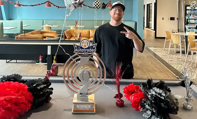 Daytona 500 winner Tyler Reddick poses at Airspeed at the 23XI Racing luncheon, in Huntersville, N.C., Tuesday, Feb. 24, 2026, celebrating his victory. (AP Photo/Jenna Fryer)