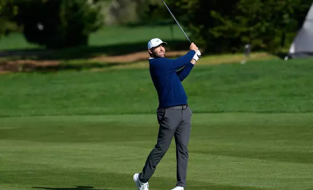 Scottie Scheffler hits from the ninth fairway at Spyglass Hill Golf Course during the second round of the AT&amp;T Pebble Beach Pro-Am golf tournament in Pebble Beach, Calif., Friday, Feb. 13, 2026. (AP Photo/Godofredo A. Vásquez)