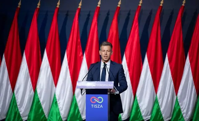Péter Magyar, leader of the opposition Tisza party who will challenge Prime Minister Viktor Orbán in national elections on April 12, speaks during the party's campaign opener event in Budapest, Hungary on Sunday, Feb. 15, 2026. (AP Photo/Denes Erdos)