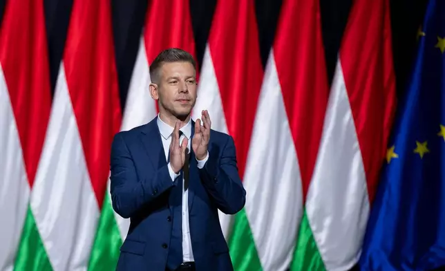 Péter Magyar, leader of the opposition Tisza party who will challenge Prime Minister Viktor Orbán in national elections on April 12, speaks during the party's campaign opener event in Budapest, Hungary on Sunday, Feb. 15, 2026. (AP Photo/Denes Erdos)