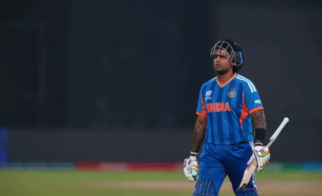 India's captain Suryakumar Yadav reacts as he leaves the ground after losing his wicket during the T20 World Cup cricket match between India and Namibia in New Delhi, India, Thursday, Feb. 12, 2026. (AP Photo/Manish Swarup)