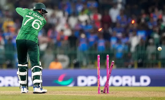 Pakistan's Usman Tariq is bowled out by India's Hardik Pandya during the T20 World Cup cricket match between India and Pakistan in Colombo, Sri Lanka, Sunday, Feb. 15, 2026. (AP Photo/Eranga Jayawardena)
