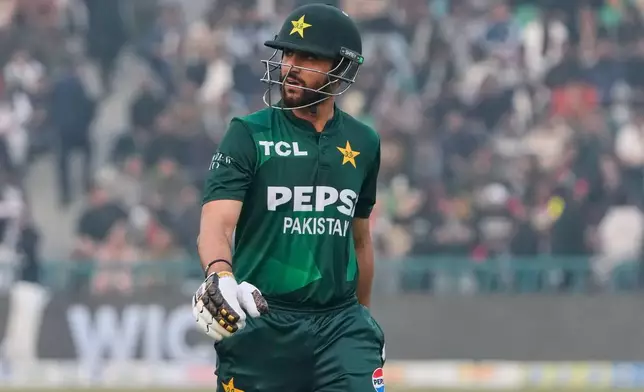 FILE - Pakistan's Salman Ali Agha walks off the field after his dismissal during the third T20 cricket match between Pakistan and Australia, in Lahore, Pakistan, Sunday, Feb. 1, 2026. (AP Photo/K.M. Chaudary, File)