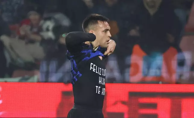 Inter's Lautaro Martinez celebrates after scoring the opening goal during the Serie A soccer match between Cremonese and Inter in Cremona, Italy, Sunday, Feb. 2026. (Alberto Mariani/LaPresse via AP)