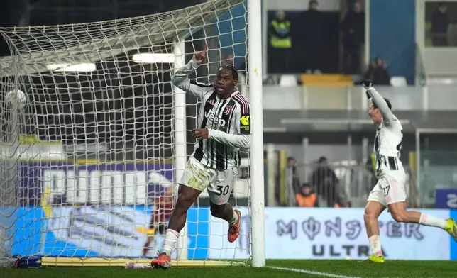 Juventus' Jonathan David celebrates after scoring his side's fourth goal during the Serie A soccer match between Parma and Juventus in Parma, Italy, Sunday, Feb. 1, 2026. (Massimo Paolone/LaPresse via AP)
