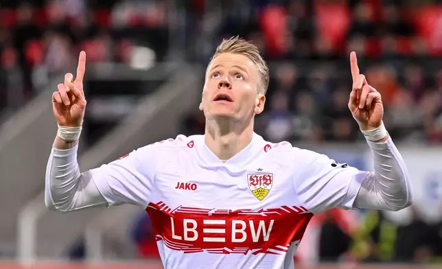 Stuttgart's Chris Führich celebrates scoring during the Bundesliga soccer match between FC Heidenheim and VfB Stuttgart in Heidenheim, Germany, Sunday Feb. 22, 2026. (Harry Langer/dpa via AP)