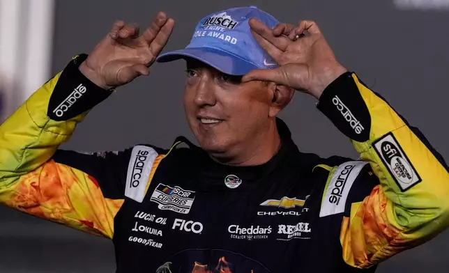 Kyle Busch prepares for a photo during NASCAR Daytona 500 qualifying, Wednesday, Feb. 11, 2026, in Daytona, Fla. (AP Photo/Mike Stewart)