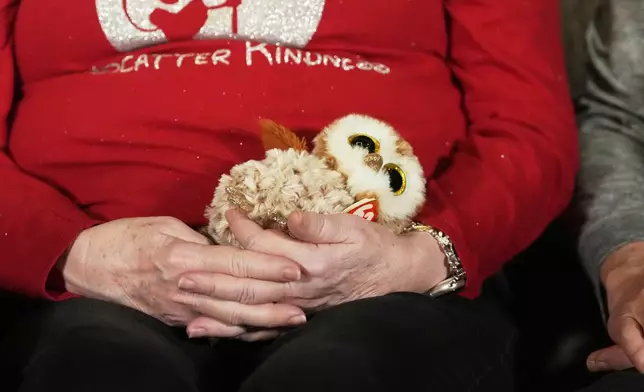 Donna Ganger, the mother of Renee Good, cradles a stuffed owl given to her by her daughter, during an interview in Denver, on Friday, Feb. 27, 2026. (AP Photo/David Zalubowski)