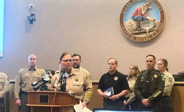 Nevada County Sheriff Shannan Moon updates media on rescue efforts following an avalanche at a news conference in Nevada City, Calif. on Wednesday, Feb. 18, 2026. (AP Photo/Tran Nguyen)