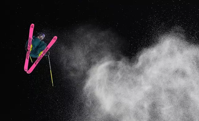 Switzerland's Mathilde Gremaud competes in the women's freestyle skiing big air qualifications at the 2026 Winter Olympics, in Livigno, Italy, Saturday, Feb. 14, 2026. (AP Photo/Lindsey Wasson)