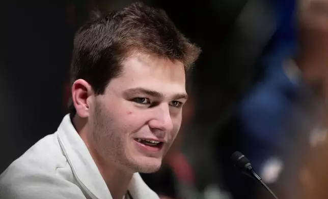 New England Patriots quarterback Drake Maye speaks during the NFL Super Bowl Opening Night on Monday, Feb. 2, 2026, in San Jose, Calif., ahead of the Super Bowl 60 football game between the Seattle Seahawks and the New England Patriots. (AP Photo/Charlie Riedel)