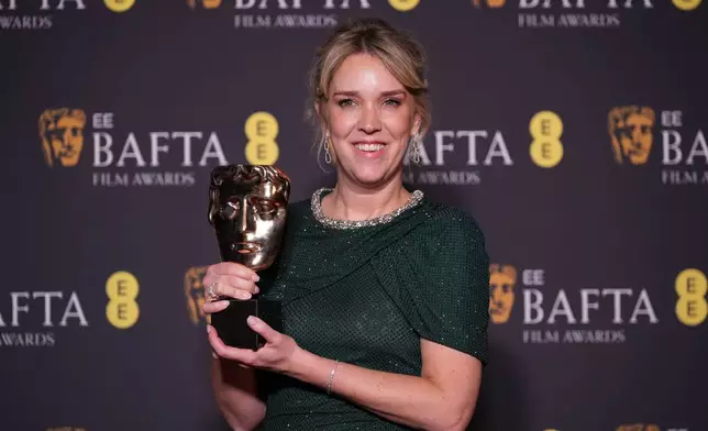Lauren Evans poses with the award for casting for 'I Swear' at the 79th British Academy Film Awards, BAFTA's, in London, Sunday, Feb. 22, 2026. (AP Photo/Alastair Grant)
