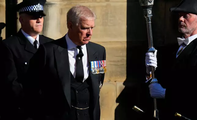 FILE - Prince Andrew leaves St. Giles Cathedral after the arrival of the coffin containing the remains of his mother Queen Elizabeth, in Edinburgh, Scotland, Sept. 12, 2022. (AP Photo/Petr David Josek, File)