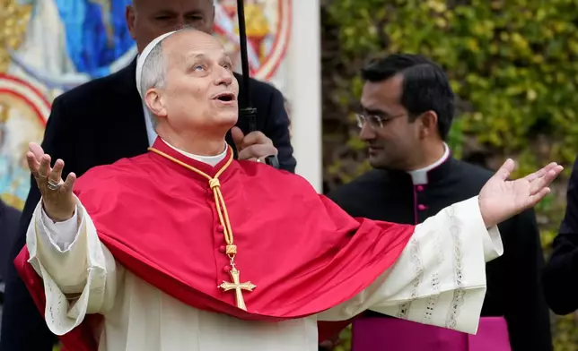Pope Leo XIV arrives to bless a mosaic of the Virgin Mary and a statue of St. Rose of Lima in the Vatican Gardens, Saturday, Jan. 31, 2026. (AP Photo/Andrew Medichini)