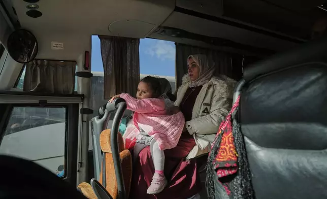 Palestinian patients ride a bus in Khan Younis as they travel to the Rafah crossing to leave the Gaza Strip for medical treatment abroad, Tuesday, Feb. 3, 2026. (AP Photo/Jehad Alshrafi)