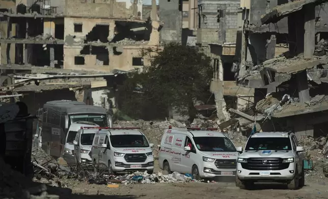 A U.N. vehicle escorts ambulances and a bus carrying Palestinian patients in Khan Younis as they travel to the Rafah crossing to leave the Gaza Strip for medical treatment abroad, Tuesday, Feb. 3, 2026. (AP Photo/Jehad Alshrafi)