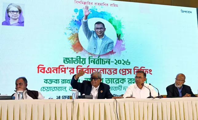 Bangladesh Nationalist Party Chairperson Tarique Rahman, second right, speaks at a press conference after his party won the national parliamentary election, in Dhaka, Bangladesh, Saturday, Feb. 14, 2026. (AP Photo/Mahmud Hossain Opu)