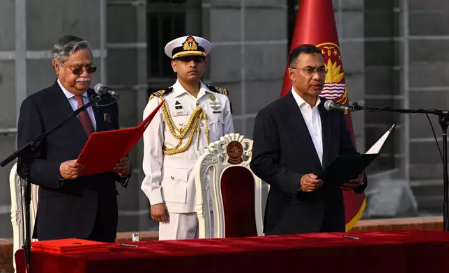 Tarique Rahman, Chairperson of the Bangladesh Nationalist Party, takes oath as Prime Minister of Bangladesh from President Mohammed Shahabuddin, left, at the National Parliament in Dhaka, Bangladesh, Tuesday, Feb.17, 2026. (AP Photo/Mahmud Hossain Opu)