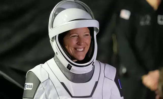 Crew 12 ESA astronaut Sophia Adenot, of France, leaves the Operations and Checkout building before heading to pad 40 at the Cape Canaveral Space Force Station in Cape Canaveral, Fla., Friday, Feb. 13, 2026, on a mission to the International Space Station. (AP Photo/John Raoux)