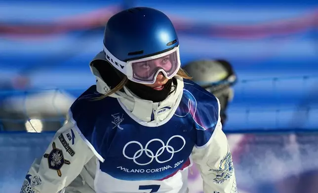 China's Eileen Gu looks on during women's freestyle skiing slopestyle qualifications at the 2026 Winter Olympics, in Livigno, Italy, Saturday, Feb. 7, 2026. (AP Photo/Gregory Bull)