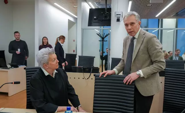 Defense attorneys Ellen Holager Andenaes, left, and Petar Sekulic, sit at the start of the first day of trial against Marius Borg Hoiby, charged with a total of 38 incidents, including four rapes, assault, violence, threats, damage, storage and delivery of marijuana, violation of a restraining order and violation of the Road Traffic Act, in Oslo, Norway, Tuesday Feb. 3, 2026.(Ole Berg-Rusten/NTB Scanpix via AP)