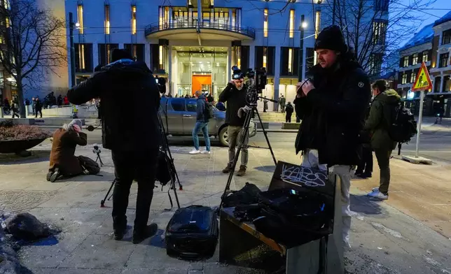 Members of the media gather ahead of the first day of the trial against Marius Borg Høiby in Oslo, Norway Tuesday, Feb. 3, 2026. (Lise Åserud/NTB Scanpix via AP)