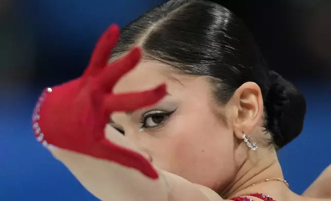 Adeliia Petrosian of Individual Neutral Athletes competes during the women's figure skating free program at the 2026 Winter Olympics, in Milan, Italy, Thursday, Feb. 19, 2026. (AP Photo/Stephanie Scarbrough)