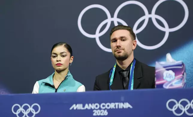 Adeliia Petrosian of Individual Neutral Athletes reacts to her score after competing in the women's figure skating free program at the 2026 Winter Olympics, in Milan, Italy, Thursday, Feb. 19, 2026. (AP Photo/Stephanie Scarbrough)