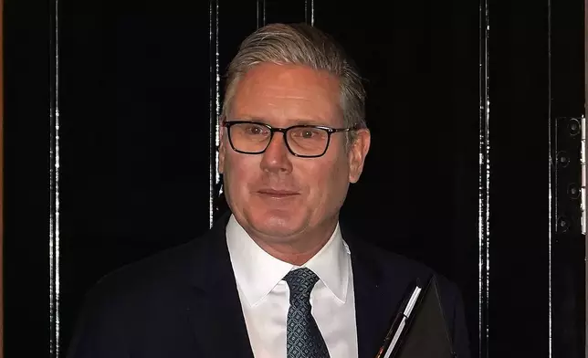 Britain's Prime Minister Keir Starmer leaves 10 Downing Street in London, Monday, Feb. 9, 2026.(AP Photo/Alberto Pezzali)