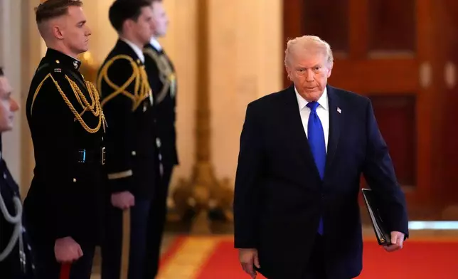 President Donald Trump arrives for an event to proclaim "Angel Family Day" in the East Room of the White House, Monday, Feb. 23, 2026, in Washington. (AP Photo/Alex Brandon)