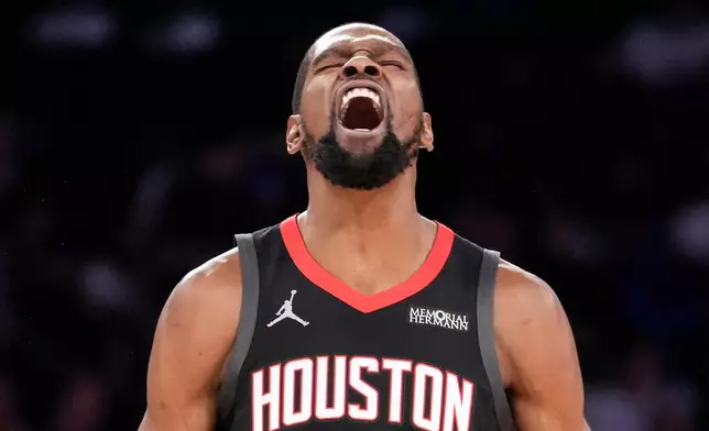 Houston Rockets forward Kevin Durant (7) reacts after scoring a 3-point goal during the second half of an NBA basketball game, Saturday, Feb. 21, 2026, in New York. (AP Photo/Yuki Iwamura)