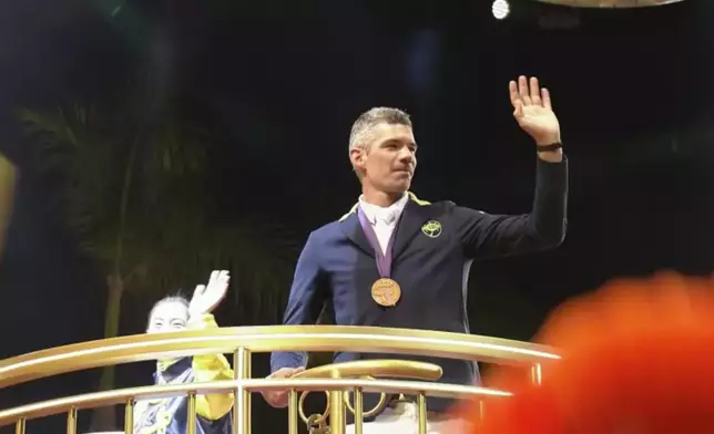 Equestrian representatives waving to the audience on the Hong Kong Jockey Club's float. Photo source: Screenshot of the Tourism Board's YT video
