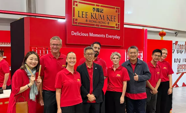 (Fourth from left) Vincent Wong, President - APAC of Lee Kum Kee Sauce, pictured with the New Zealand market team at the booth.