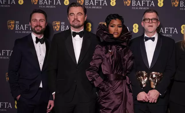 Andy Jurgensen, from left, Leonardo DiCaprio, Teyana Taylor, and Paul Thomas Anderson pose with the awards for best director, cinematography, and adapted screenplay for 'One Battle After Another' at the 79th British Academy Film Awards, BAFTA's, in London, Sunday, Feb. 22, 2026. (AP Photo/Alastair Grant)