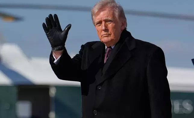 President Donald Trump waves after arriving on Air Force One, Wednesday, March 18, 2026, at Joint Base Andrews, Md., after attending the casualty return at Dover Air Force Base, Del., for the six crew members of an Air Force refueling aircraft who died when their plane crashed in western Iraq while supporting operations against Iran. (AP Photo/Julia Demaree Nikhinson)