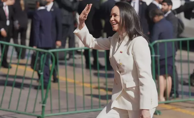 Venezuelan opposition leader Maria Corina Machado arrives to Congress to attend the inauguration ceremony of Chile's new President Jose Antonio Kast in Valparaiso, Chile, Wednesday, March 11, 2026. (AP Photo/Gustavo Garello)