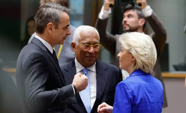 From left, Greece's Prime Minister Kyriakos Mitsotakis, European Council President Antonio Costa and European Commission President Ursula von der Leyen speak during a round table meeting at the EU summit in Brussels, Thursday, March 19, 2026. (AP Photo/Geert Vanden Wijngaert)