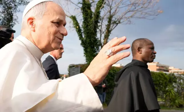 Pope Leo XIV visits the parish complex of the Santa Maria della Presentazione on the outskirts of Rome, Sunday, March 8, 2026. (AP Photo/Gregorio Borgia)