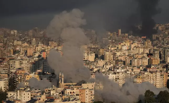 Smoke rises from Israeli airstrikes in Dahiyeh, a southern suburb of Beirut, Lebanon, Tuesday, March 3, 2026. (AP Photo/Hussein Malla)