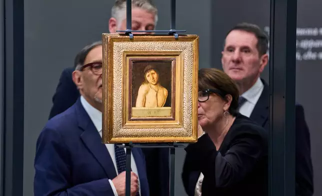From left, Italian Senate President Ignazio La Russa, Culture Minister Alessandro Giuli, ITA President Sandro Pappalardo, and Director of the National Museum of Abruzzo Federica Zalabra look at Antonello da Messina's Ecce Homo, a tempera-on-panel painting dating from around 1470 and measuring 20.3 by 14.9 centimeters, recently acquired by the Italian General Directorate of Museums for $14.9 million, or about 12.6 million euros in Rome, Thursday, March 26, 2026 . (AP Photo/Domenico Stinellis)
