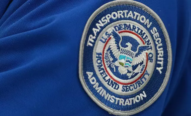 A Transportation Security Administration (TSA) workers's patch is displayed at Philadelphia International Airport, Tuesday, March 24, 2026, in Philadelphia. (AP Photo/Matt Rourke)