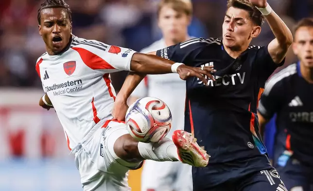 FC Dallas' Kaick, left, battles San Diego FC's David Vazquez (19) during an MLS soccer match, Saturday, March 14, 2026, in Frisco, Texas. (AP Photo/Brandon Wade)