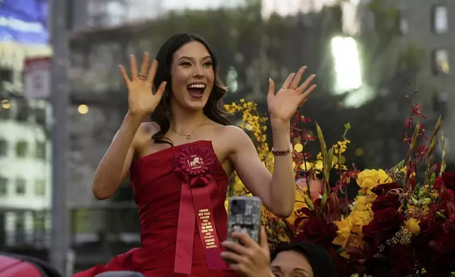Olympic gold medalist and Grand Marhsal Eileen Gu waves during the Chinese New Year Parade in San Francisco, Saturday, March 7, 2026. (AP Photo/Jeff Chiu)