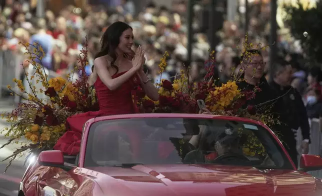 Olympic gold medalist and Grand Marhsal Eileen Gu gestures during the Chinese New Year Parade in San Francisco, Saturday, March 7, 2026. (AP Photo/Jeff Chiu)